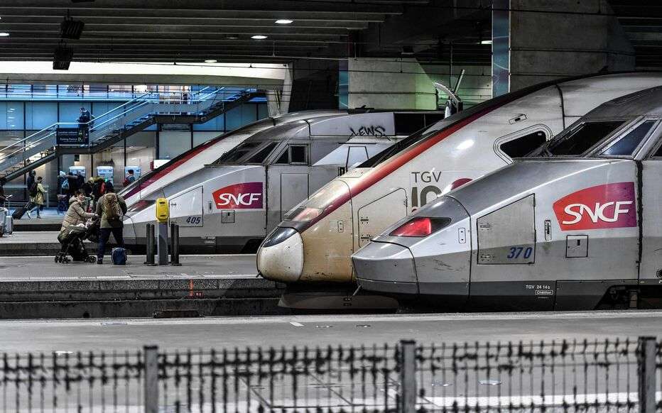 (FILES) TGV trains of French national railway operator SNCF are seen at Gare Montparnasse train station in Paris on January 2, 2020 on the 29th day of a nationwide multi-sector strike against the government's pensions overhaul. Chaos might be expected at main railway stations at the height of the upcoming school holiday weekend on February 19, 2024: French railway operator SNCF is hoping to operate one TGV high speed train out of two on Friday, Saturday and Sunday due to a strike by ticket inspectors. (Photo by STEPHANE DE SAKUTIN / AFP)