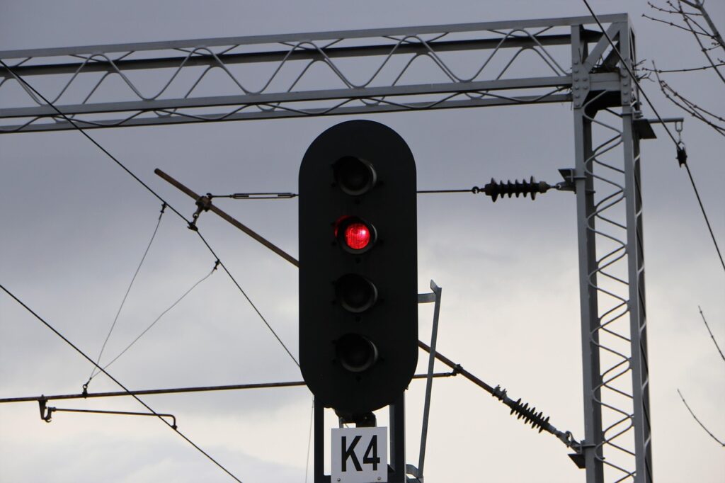 railroad signal, cables, red signal, railway signal, light signal, semaphore, rail, railway, railroad, electric cables, electric wires, nature, dramatic sky, cloudy, clouds, outdoors